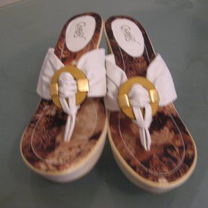 never worn ,size 11 womens platform thong  leather,heel , made in Brazil